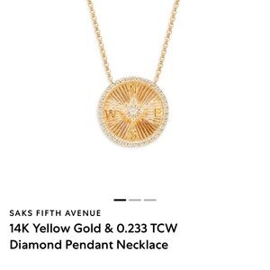 14k gold and diamond compasses necklace Saks fifth Ave. NEVER WORN
